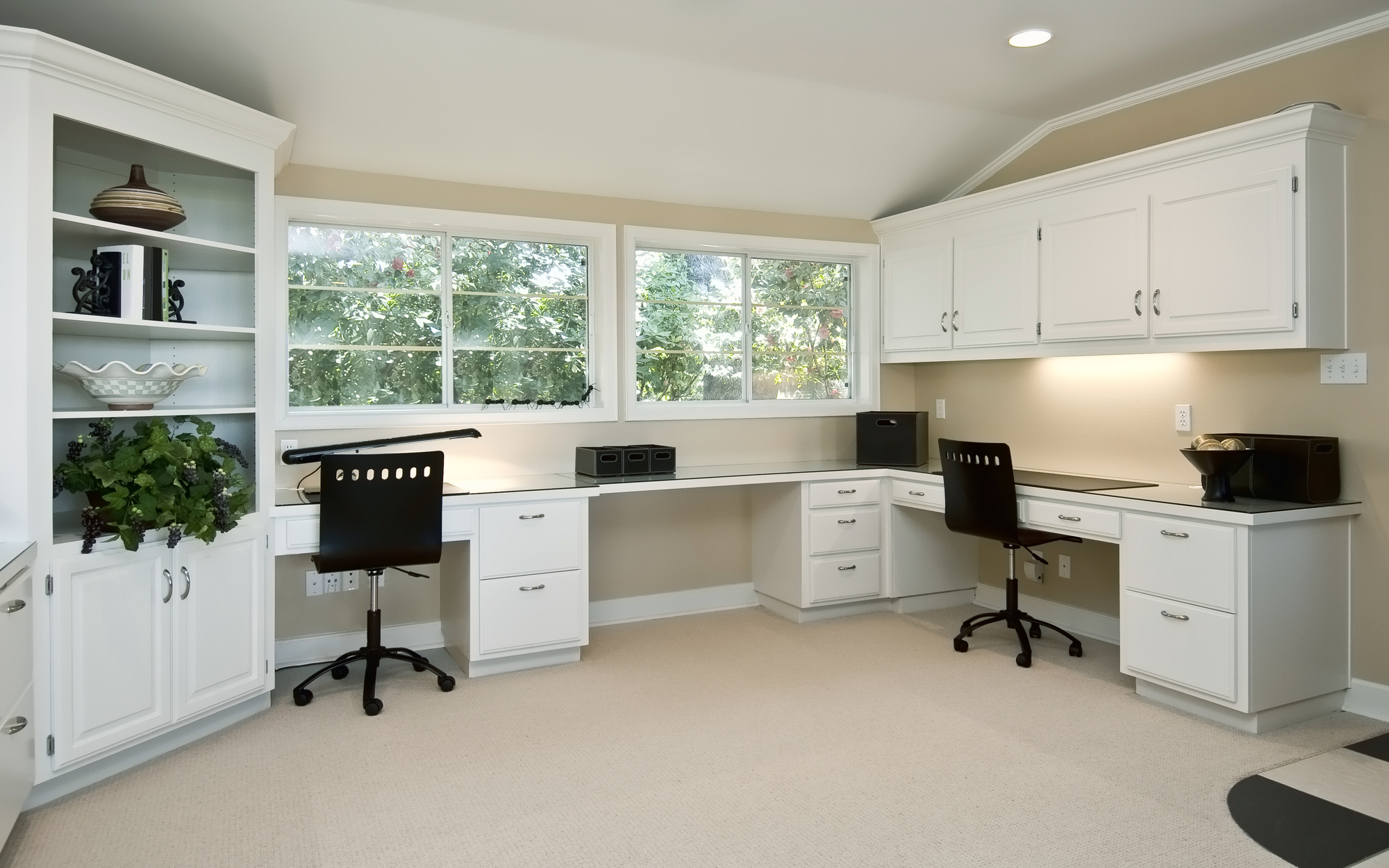 home office large home office area, three work areas with cabinets and book shelves, two large windows